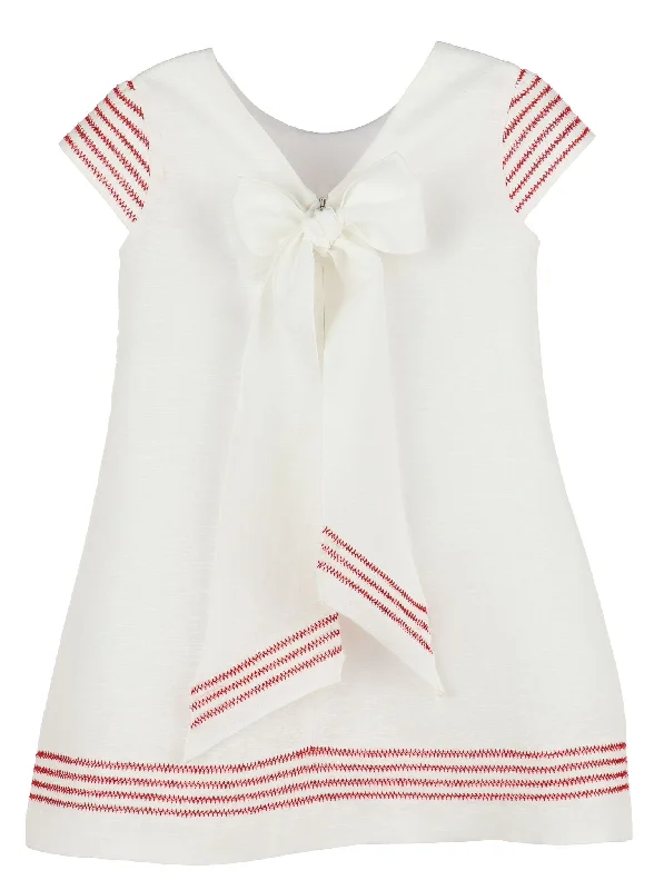 Linen-cotton dress embroidered with red thread.